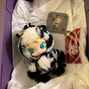 Stylish Black and White Molly keychain doll. From the Have a Run Popmart series